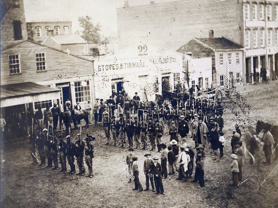 Photo of soldiers of the 9th Missouri State Militia Cavalry drilling in the streets of St. Joseph, Missouri, probably taken in 1863 or 1864.