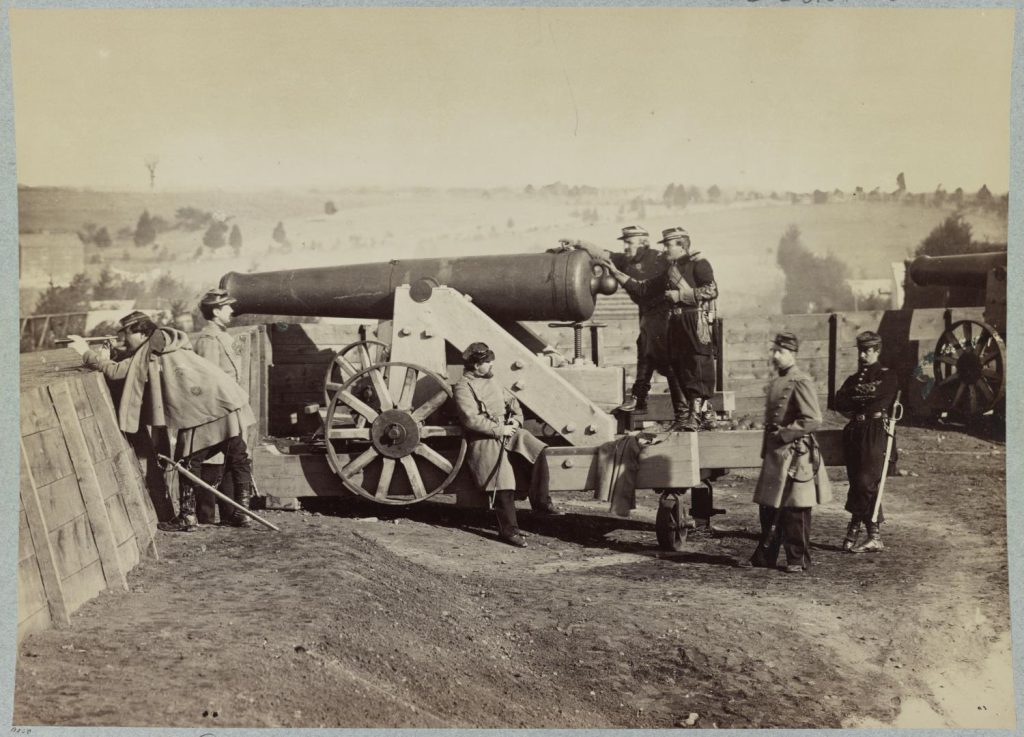 Officers of the 55th New York Infantry manning a gun at Fort Gaines.
