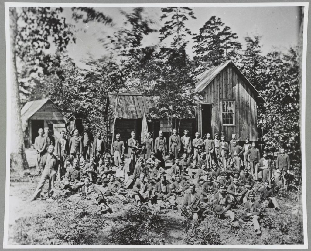 A group of 21st Michigan Infantry soldiers pose in the field in the undated photo.
